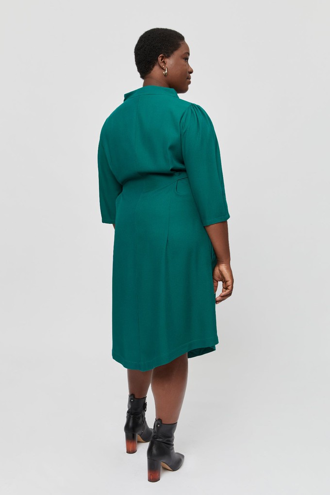 Suzi | Belted Angle Dress with Boat Neckline in Emerald Green from AYANI