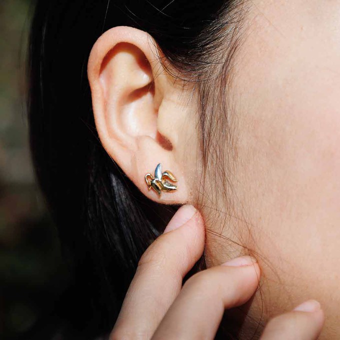 Zilveren/bronzen studs banaan from Fairy Positron