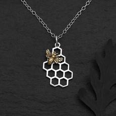Zilveren halsketting honingraat met bronzen bij via Fairy Positron