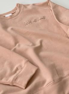 Oversized sweater met tekst – Sand via Glow - the store