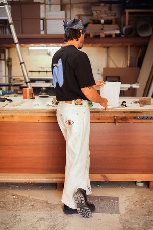 Hope Heals pleated trousers from NWHR