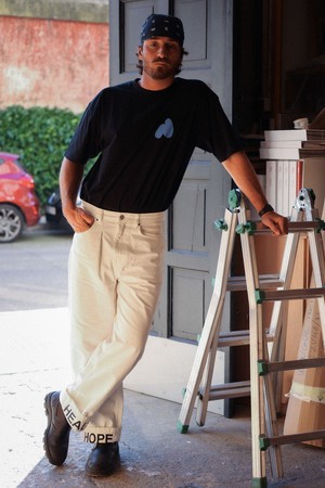 Hope Heals pleated trousers from NWHR