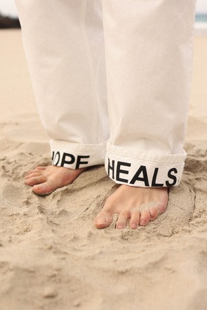 Hope Heals pleated trousers from NWHR