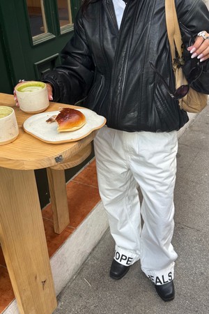 Hope Heals pleated trousers from NWHR