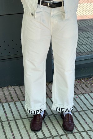 Hope Heals pleated trousers from NWHR