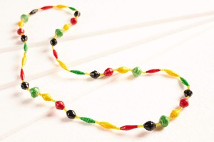 Long reggae necklace made of paper beads from PEARLS OF AFRICA