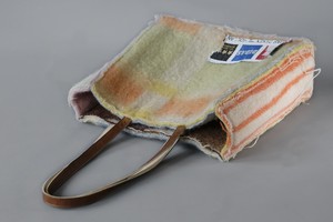 A Didas Layers Shoulder Bag with original blanket label from Pepavana
