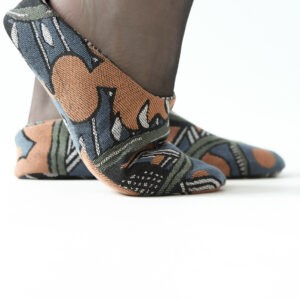 Moroccan-style carpet slippers in petrol, orange, navy and black from Pepavana