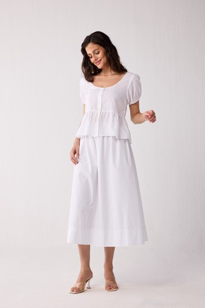 Embroidered Peplum Top with Puff Sleeves in White from Reistor