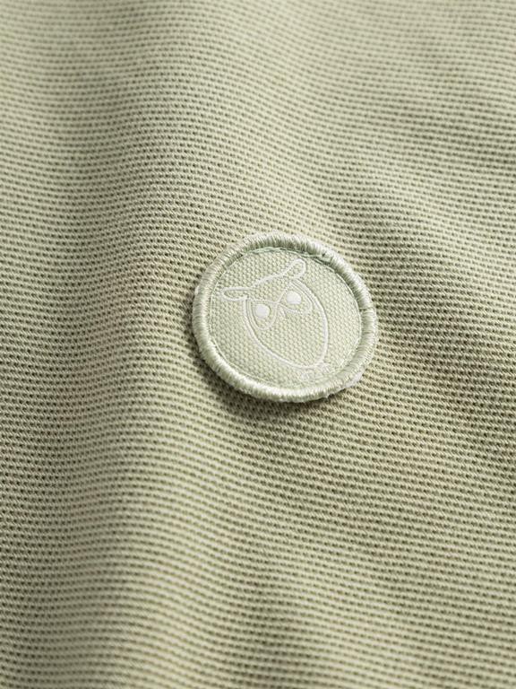 Polo T-Shirt Basic Badge Lichtgroen from Shop Like You Give a Damn