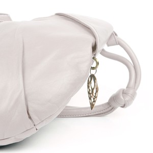 Goa - Ivory luxury leather shoulder bag with bronze beads and tassels from Treasures-Design