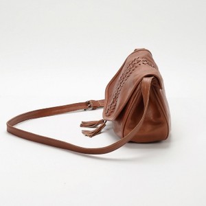 Salina leather saddle crossbody bag with embroidery details and tassel - tan from Treasures-Design